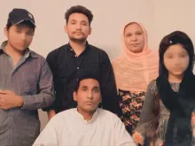 Shagufta Kausar and Shafqat Emmanuel with three of their children after being released from death row in Pakistan July 1, 2021
